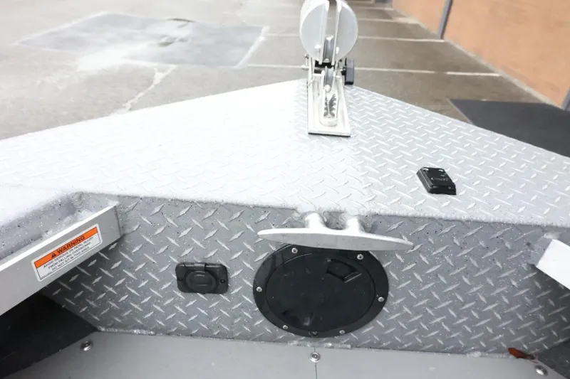 Slide: The Image of Bow of 2025 Thunder Jet 209 Rush OT with diamond plate surface and cleat. - 14