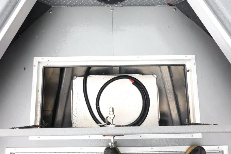 Slide: The Image of Interior view of 2025 Thunder Jet 209 Rush OT boat compartment with storage area. - 15