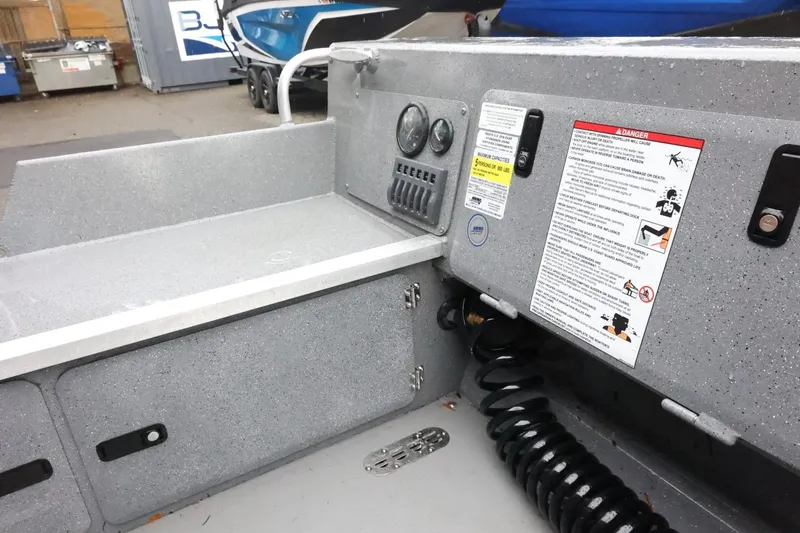 Slide: The Image of Interior view of 2025 Thunder Jet 209 Rush OT boat, featuring control panel and safety instructions. - 20