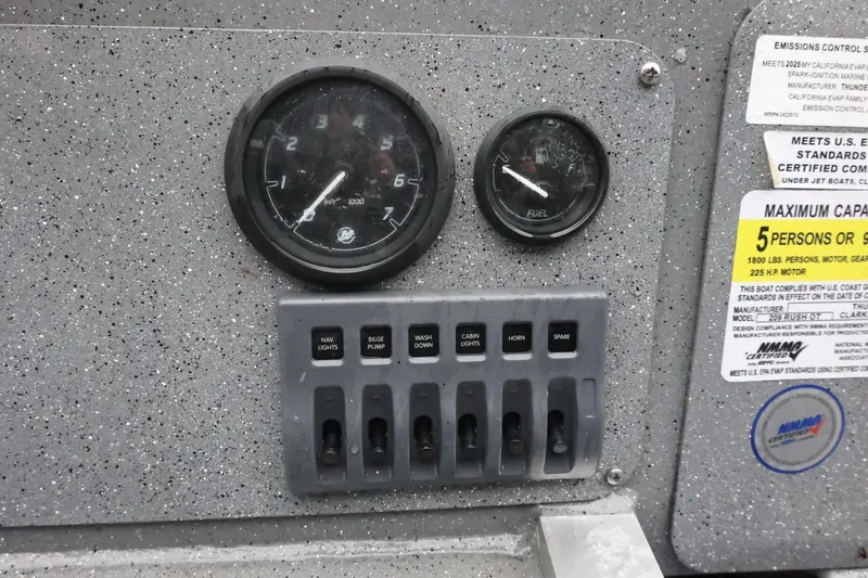 Slide: The Image of Control panel of 2025 Thunder Jet 209 Rush OT boat with gauges and switches. - 21