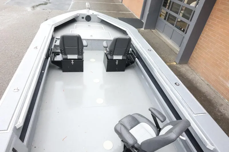 Slide: The Image of 2025 Thunder Jet 209 Rush OT boat interior with two seats and spacious deck. - 8