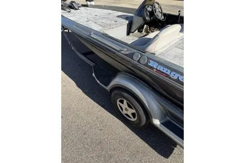 Slide: The Image of 1997 Ranger 461 VS Commanche boat on trailer, side view. - 3