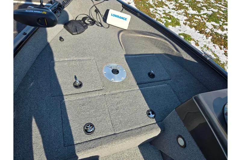 Slide: The Image of 2020 Tracker Pro Guide V-16 SC boat deck with Lowrance equipment and Minn Kota motor. - 15