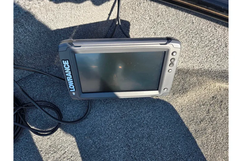 Slide: The Image of Lowrance fish finder on 2020 Tracker Pro Guide V-16 SC boat. - 18