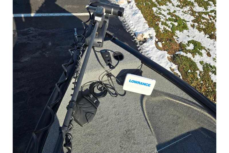 Slide: The Image of 2020 Tracker Pro Guide V-16 SC boat with Lowrance fishfinder and trolling motor. - 19