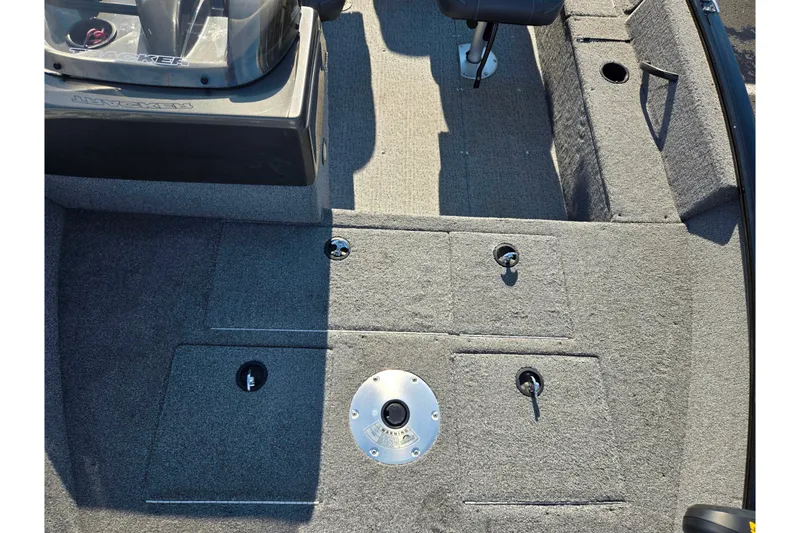 Slide: The Image of 2020 Tracker Pro Guide V-16 SC boat interior with carpeted flooring and seating. - 20