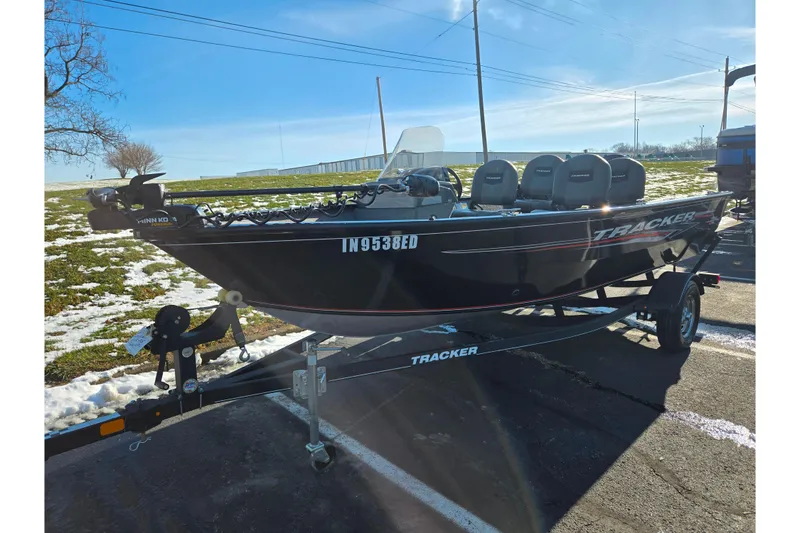 Slide: The Image of 2020 Tracker Pro Guide V-16 SC boat on trailer, parked outdoors in winter. - 6