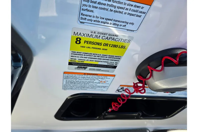 Slide: The Image of 2020 Yamaha Boats SX190 capacity label, 8 persons or 1280 lbs, safety warnings visible. - 13