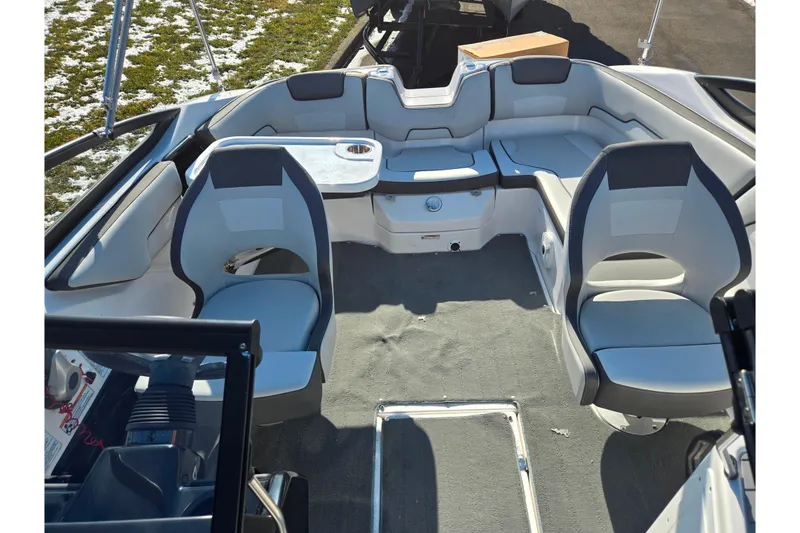 Slide: The Image of 2020 Yamaha Boats SX190 interior with seating and table, showcasing modern design and comfort. - 20
