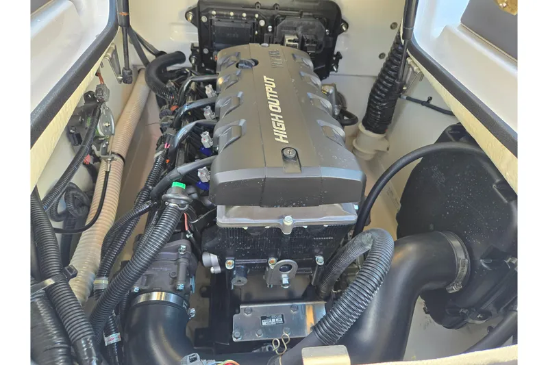Slide: The Image of Engine compartment of a 2020 Yamaha Boats SX190, showcasing high output engine components. - 22