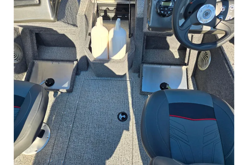 Slide: The Image of 2021 Tracker Pro Guide V-165 WT boat interior with steering wheel and seating. - 12