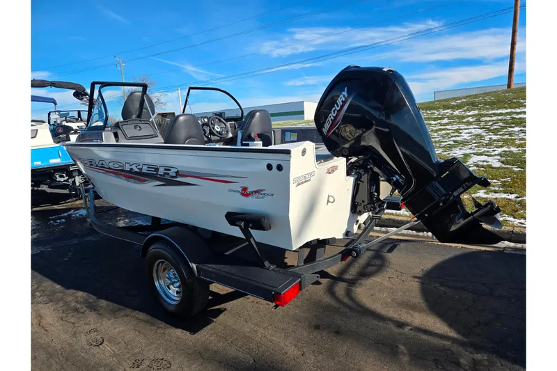 Slide: The Image of 2021 Tracker Pro Guide V-165 WT boat with Mercury outboard motor on trailer. - 3