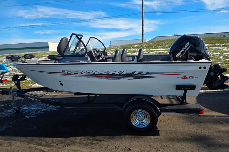 Slide: The Image of 2021 Tracker Pro Guide V-165 WT fishing boat on trailer, side view. - 4