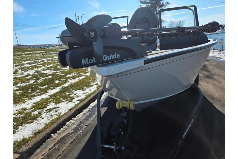 Slide: The Image of 2021 Tracker Pro Guide V-165 WT boat with Motorguide trolling motor on trailer. - 7