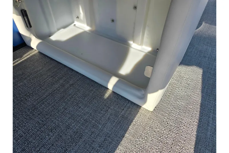 Slide: The Image of Interior detail of 2023 Barletta Corsa 23UC boat, featuring seating and flooring. - 18