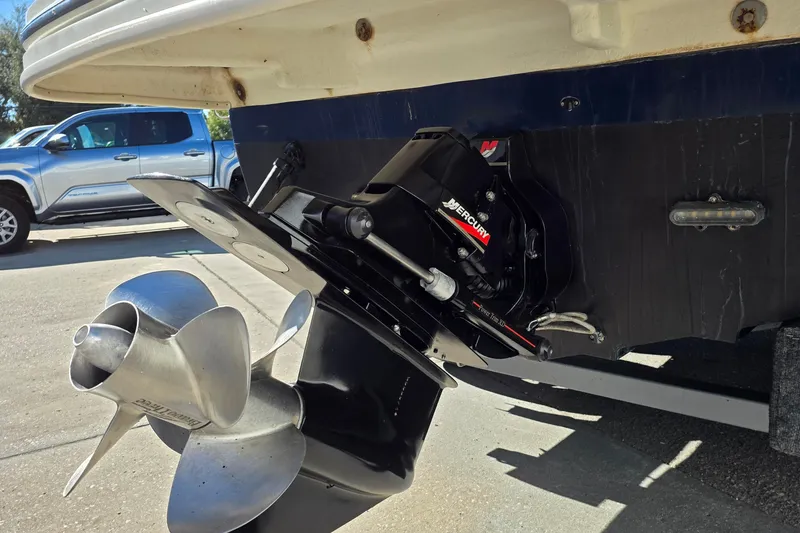 Slide: The Image of 2010 Sea Ray 260 Sundeck boat with Mercury outdrive and stainless steel propeller. - 2