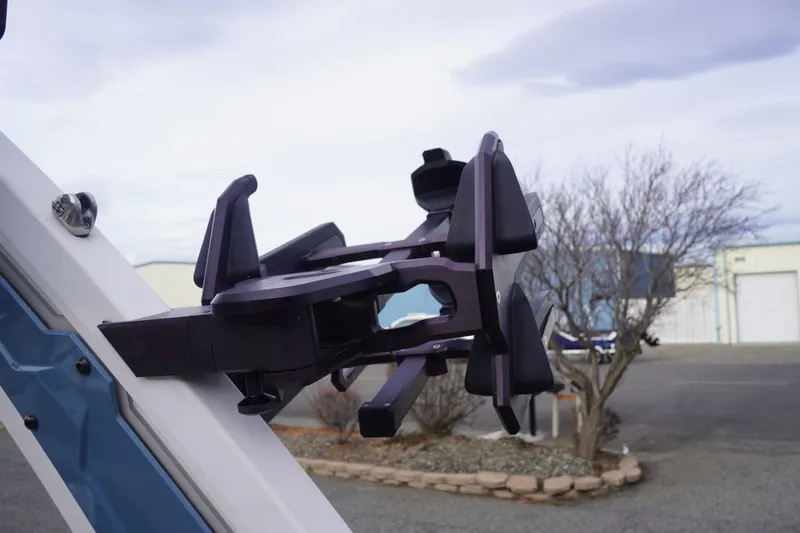 Slide: The Image of 2023 Tigé 24RZX boat accessory detail against a cloudy sky background. - 44