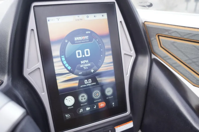 Slide: The Image of 2023 Tigé 24RZX boat touchscreen display showing speed and cruise control settings. - 56