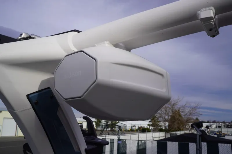 Slide: The Image of 2023 Tigé 24RZX boat speaker detail under clear sky. - 61