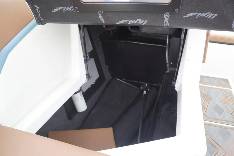 Slide: The Image of 2023 Tigé 24RZX boat interior storage compartment with modern design elements. - 72