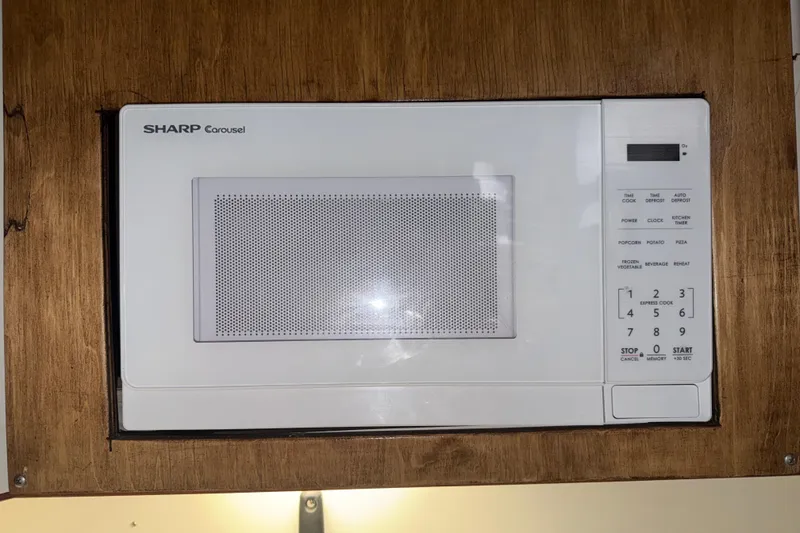 Slide: The Image of Sharp Carousel microwave in wooden cabinet, Tiara Yachts 3600 Open, 1989 model. - 37