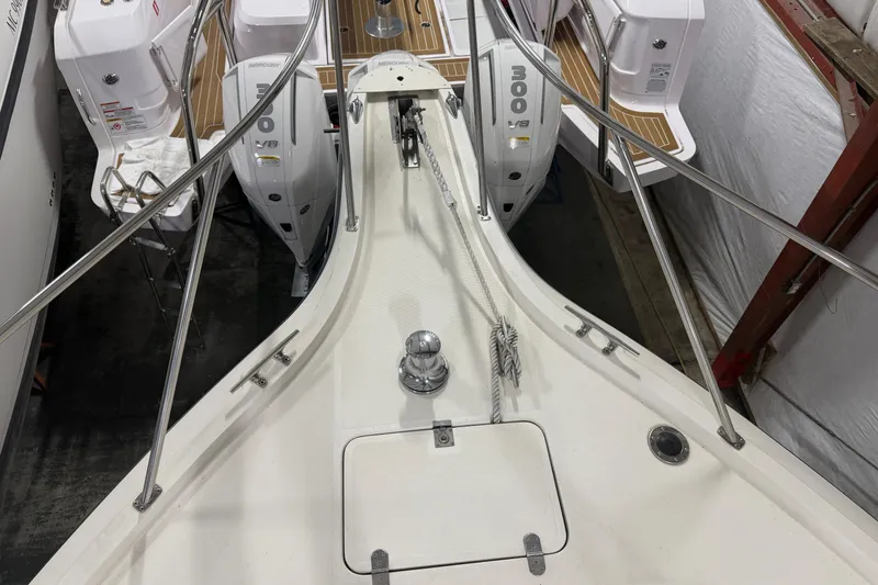 Slide: The Image of 1989 Tiara Yachts 3600 Open boat deck with dual Mercury outboard engines. - 6