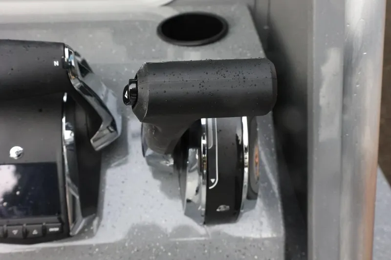 Slide: The Image of Close-up of 2026 Thunder Jet 28 Pilot boat throttle controls with water droplets. - 17
