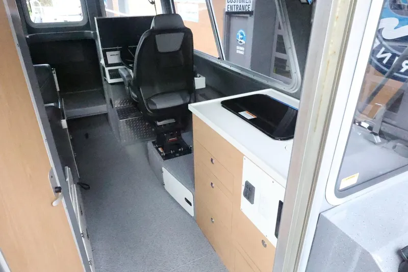 Slide: The Image of Interior of 2026 Thunder Jet 28 Pilot boat with modern cockpit and seating. - 20