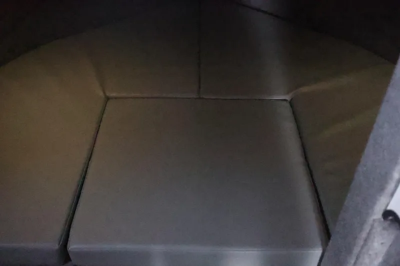 Slide: The Image of Interior cabin of 2026 Thunder Jet 28 Pilot boat with cushioned seating. - 26