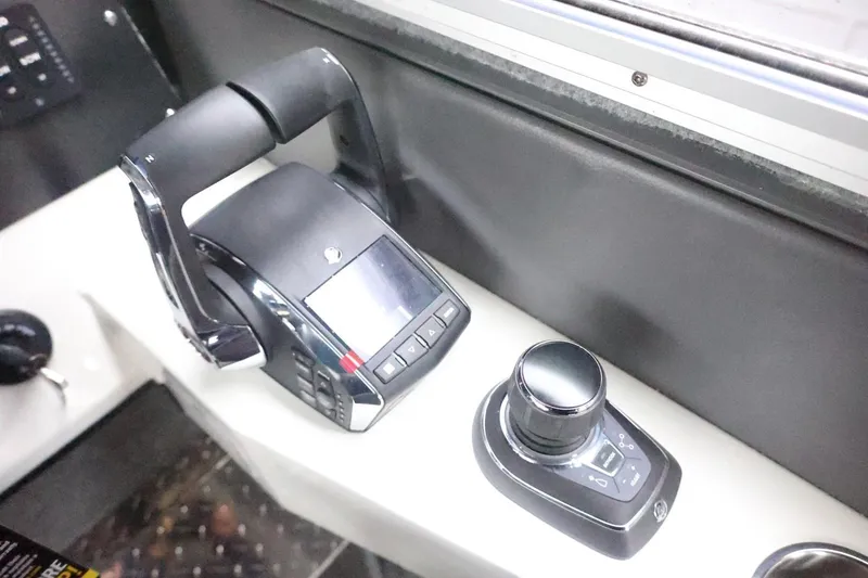 Slide: The Image of Control panel of 2026 Thunder Jet 28 Pilot boat, featuring modern throttle and joystick. - 31