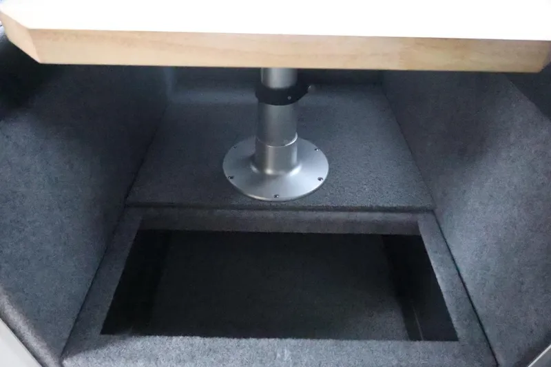 Slide: The Image of Interior view of 2026 Thunder Jet 28 Pilot boat with storage compartment. - 34