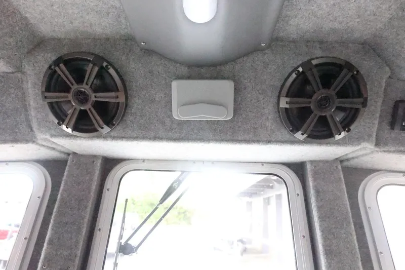 Slide: The Image of Interior of 2026 Thunder Jet 28 Pilot boat with dual speakers and windows. - 37