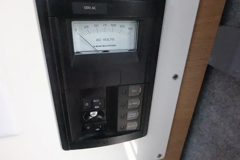 Slide: The Image of Electrical panel in 2026 Thunder Jet 28 Pilot boat, featuring AC voltage meter. - 47