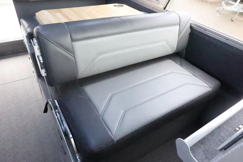 Slide: The Image of 2026 Thunder Jet 28 Pilot interior with sleek, modern seating and wooden table. - 51