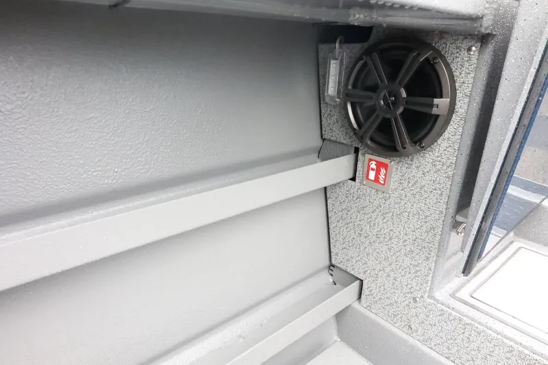 Slide: The Image of Interior of 2026 Thunder Jet 28 Pilot boat with speaker and fire extinguisher sign. - 67