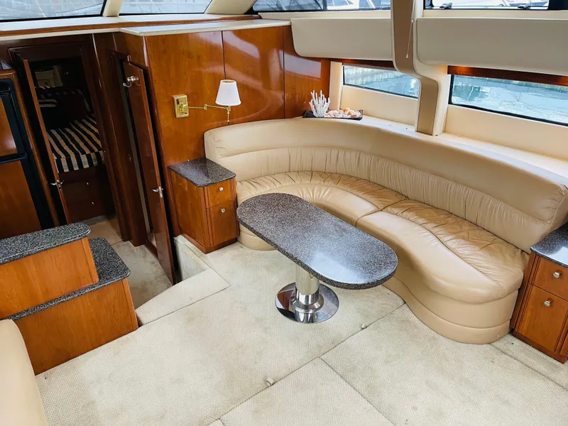 Slide: The Image of Interior of 2006 Meridian 408 Motoryacht with leather sofa and table. - 17