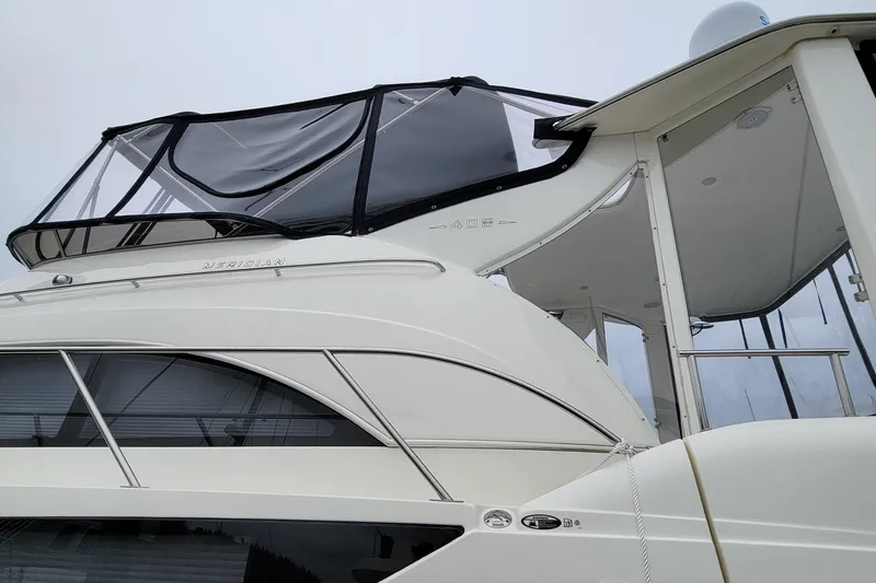 Slide: The Image of 2006 Meridian 408 Motoryacht with canopy and windows. - 3