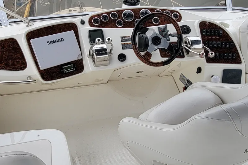 Slide: The Image of 2006 Meridian 408 Motoryacht helm with Simrad system. - 4