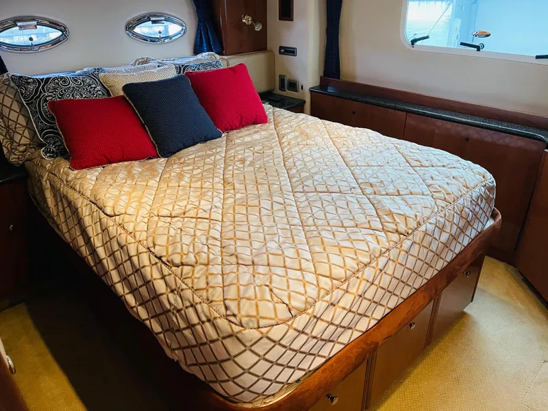 Slide: The Image of Luxurious bedroom in a 2006 Meridian 408 Motoryacht. - 8