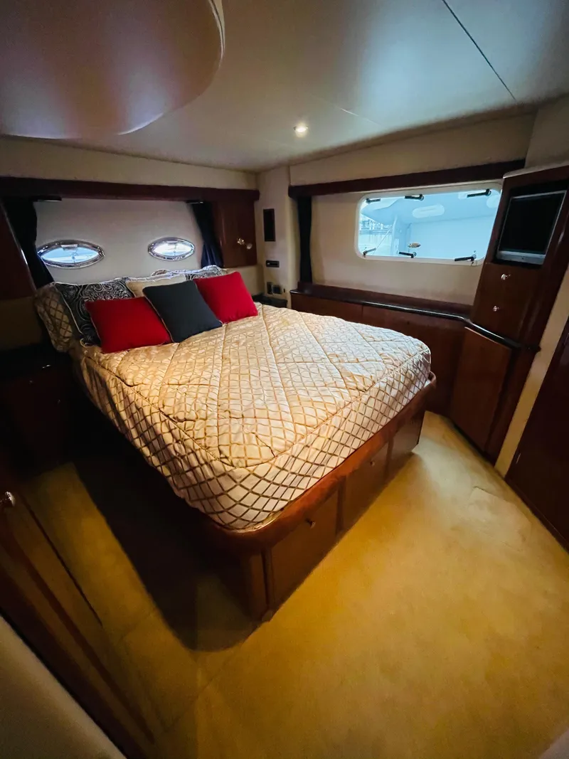Slide: The Image of Interior of 2006 Meridian 408 Motoryacht featuring cozy bedroom. - 9