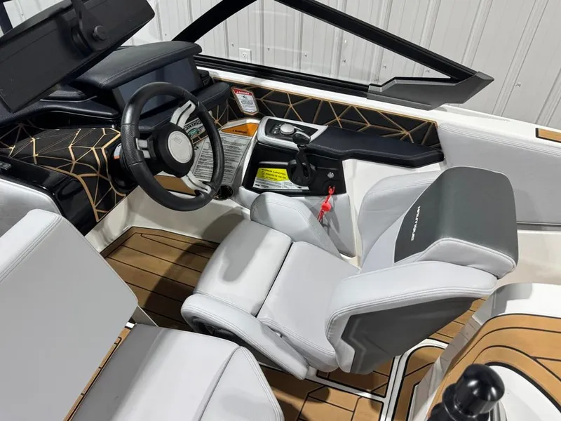 Slide: The Image of Interior of 2023 Nautique Ski Nautique 200 Open Bow boat. - 25