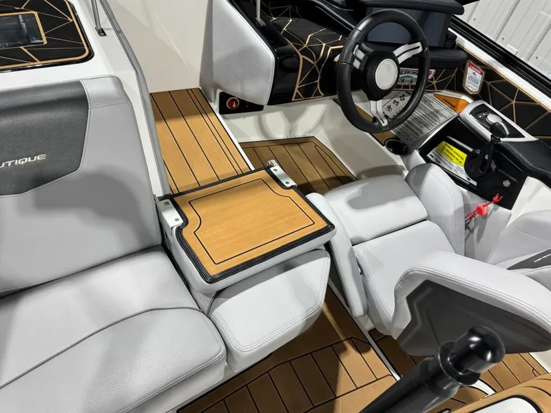 Slide: The Image of Interior of 2023 Nautique Ski Nautique 200 Open Bow boat. - 26