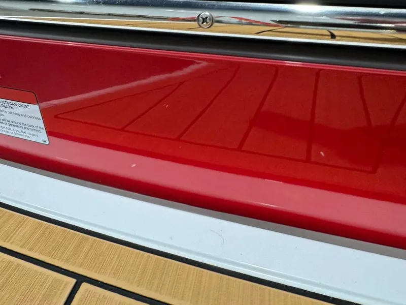 Slide: The Image of Red stern of 2023 Nautique Ski Nautique 200 Open Bow boat. - 30