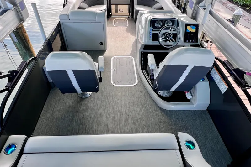 Slide: The Image of 2023 Barletta Corsa 23UC boat interior with modern helm and seating. - 28