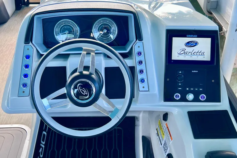 Slide: The Image of 2023 Barletta Corsa 23UC dashboard with steering wheel and digital display. - 36