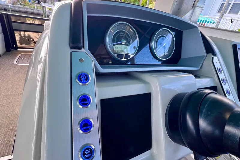 Slide: The Image of 2023 Barletta Corsa 23UC dashboard with illuminated controls and gauges. - 38