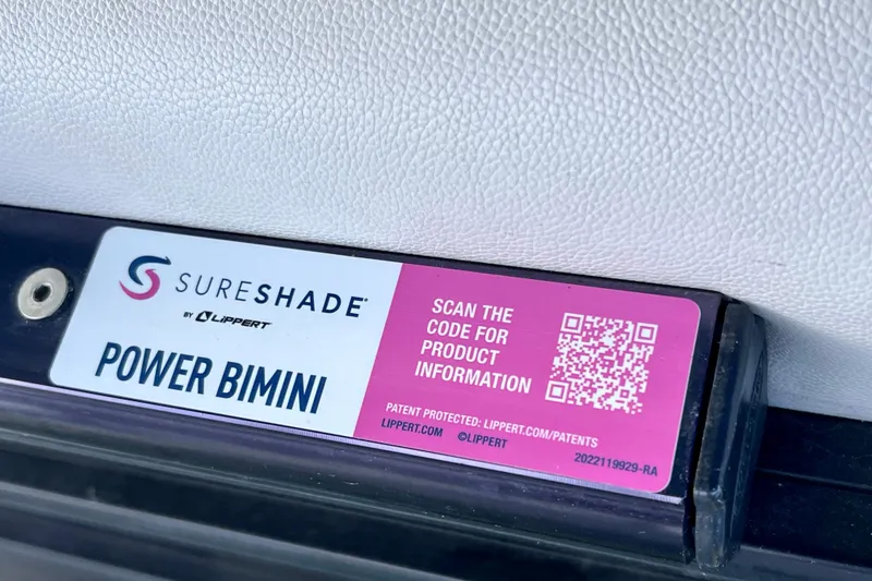 Slide: The Image of SureShade Power Bimini label with QR code on 2023 Barletta Corsa 23UC boat. - 41