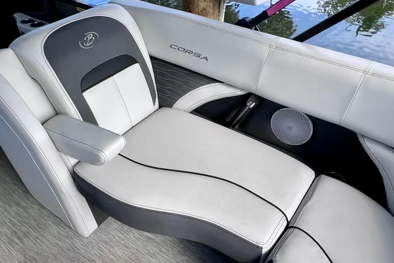 Slide: The Image of 2023 Barletta Corsa 23UC boat interior with luxurious seating and speaker system. - 51