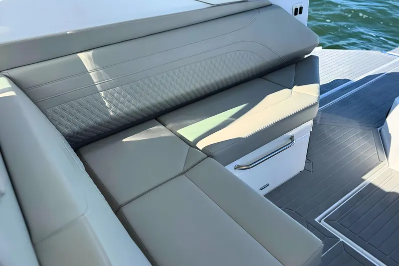Slide: The Image of Luxurious seating on 2024 Cruisers Yachts 38 GLS OB, featuring elegant upholstery and modern design. - 20