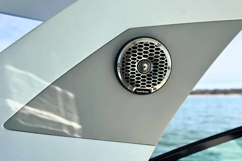 Slide: The Image of 2024 Cruisers Yachts 38 GLS OB speaker detail with water view. - 29